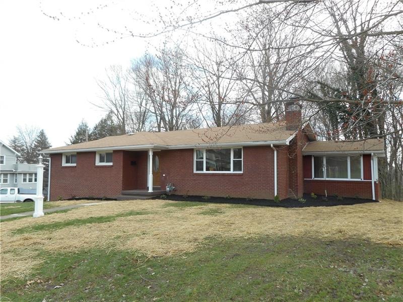 Solid brick ranch with all new landscaping.