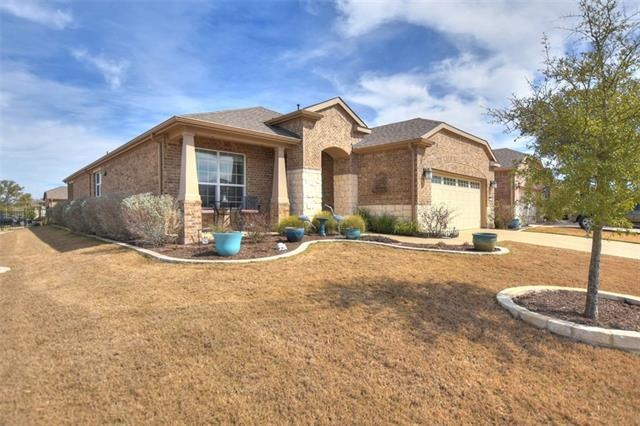 Perched prettily on a corner lot mere minutes from the upcoming community center, this smart Sun City Texas martin Ray features a private back yard and an additional Sun Room!