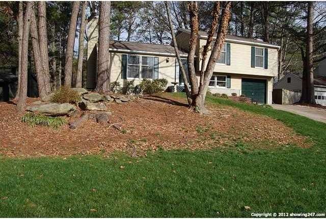 Exterior Front. ELEGANT SPLIT LEVEL HOME IN MARTIN