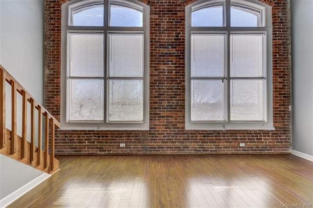 Two-story great room in light-filled industrial lo