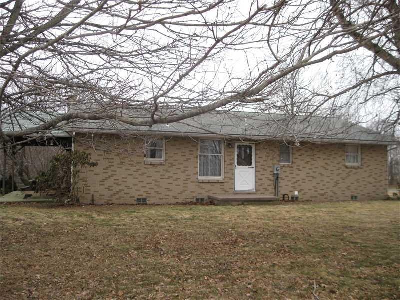 Exterior Front. 5 acres, 2 car integral garage, de