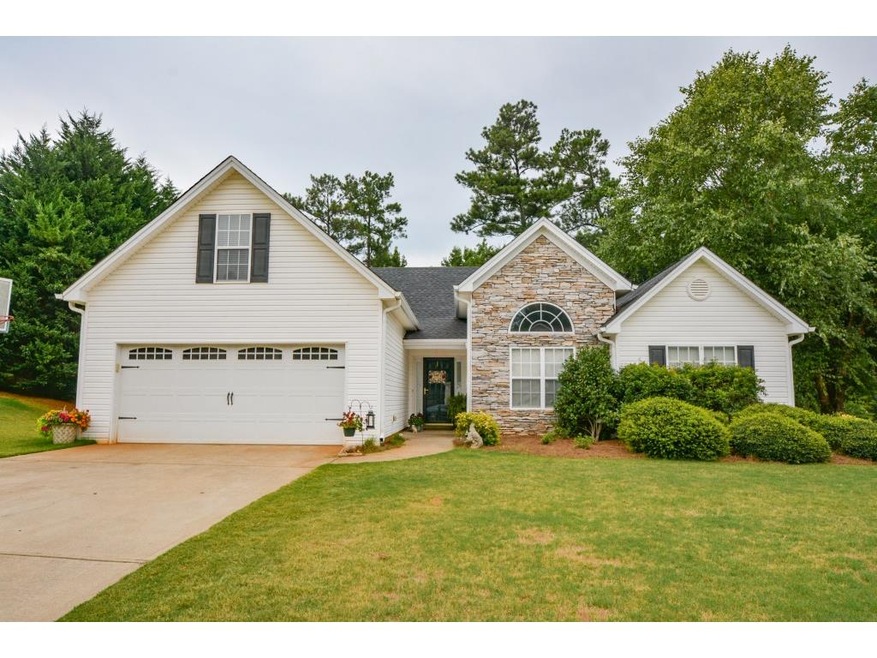 New garage doors on this Flowery Branch ranch! GRE