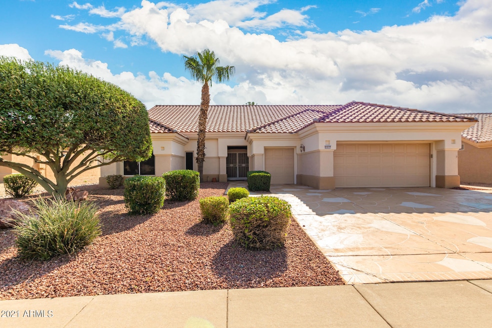 Front of Home w/Golf Cart Garage