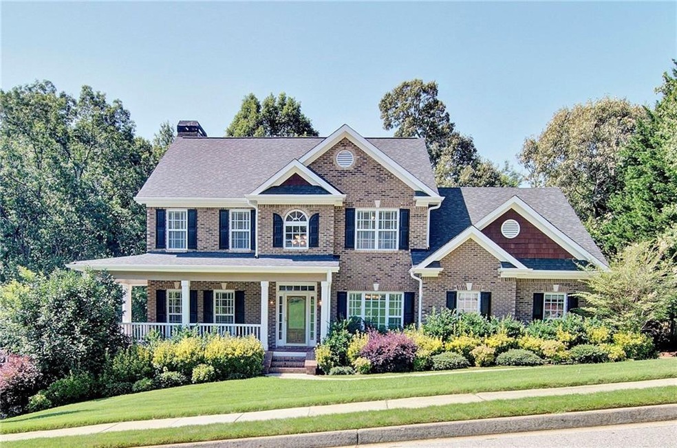 Welcome Home to this 3-side brick beauty in family