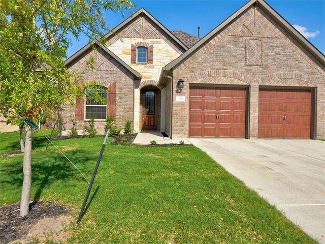 Beautiful Front Exterior with Brick & Stone Accent