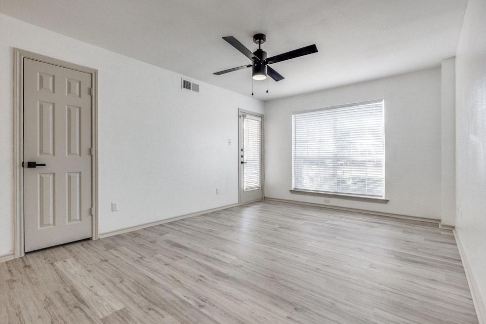 Unfurnished room with wood finished floors, ceilin