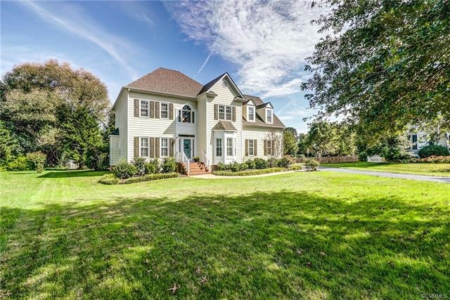 Private, beautifully landscaped yard with mature p