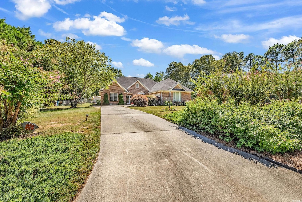 Ranch-style home with a front lawn