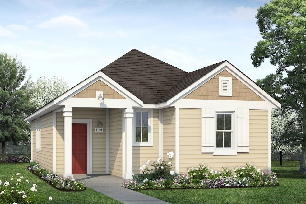 View of front of house with a front lawn and a sh