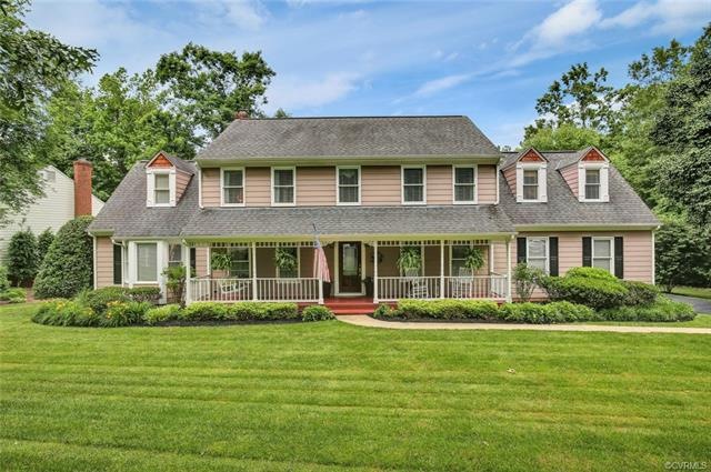 Gorgeous custom built home located on almost a hal