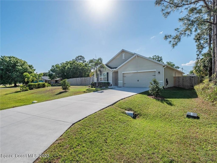 734 Simon St SE, Palm Bay, FL 32909 - photo 1