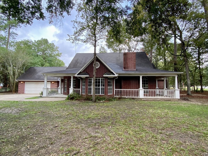 9 W Forest Ct, Conroe, TX 77384 - photo 1