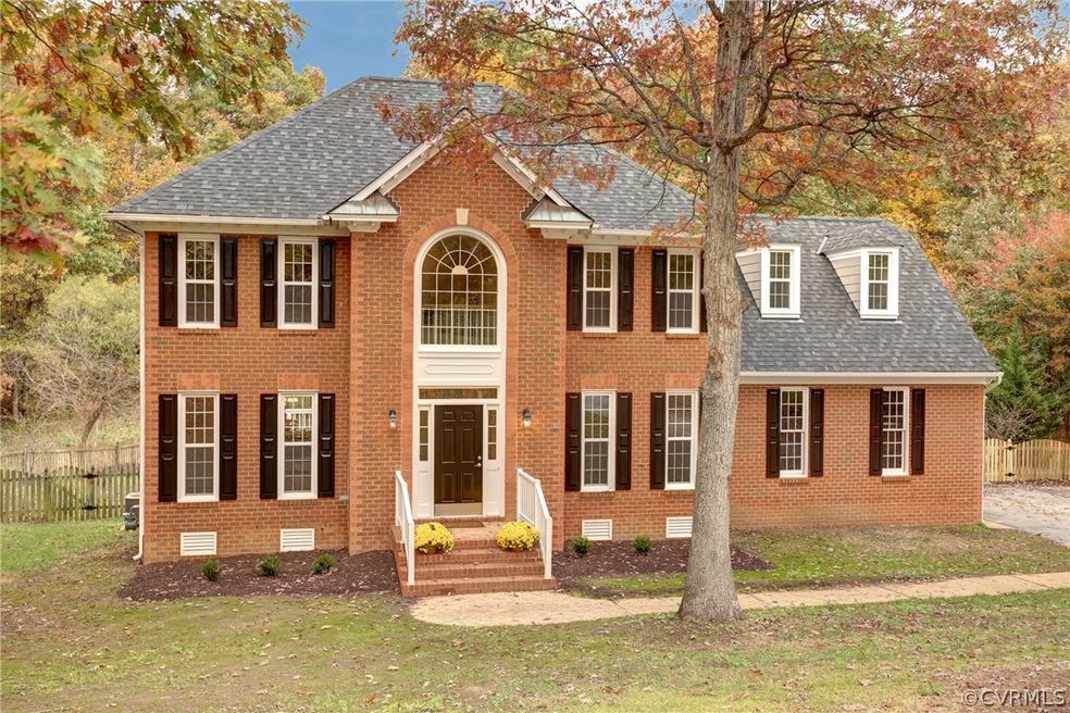 Beautiful brick front home with spacious rear fenc