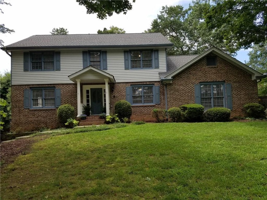 Welcome home! Side entry 2 car garage.