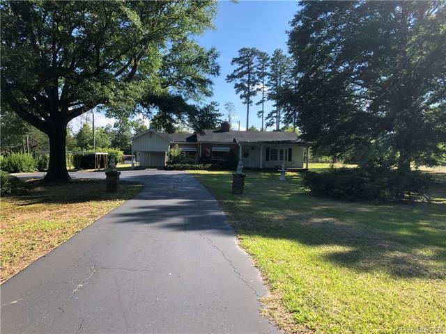 Great potential on this 6+ acres with beautiful oa
