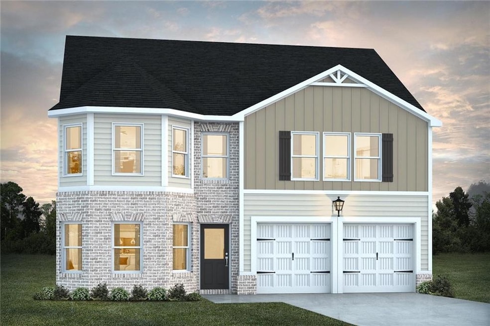View of front of house with an attached garage and