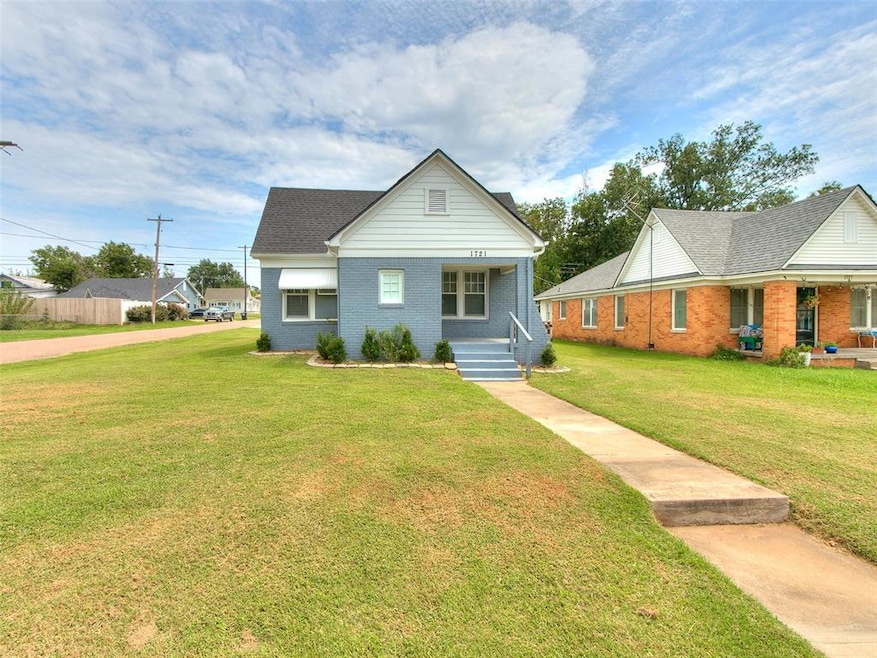 View of front of house with covered porch and a fr
