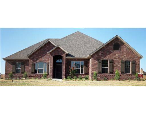 Exterior Front. Beautiful all brick home with a co