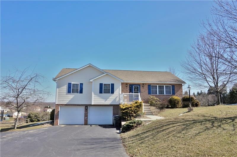 Beautiful curb appeal! Driveway features extra par