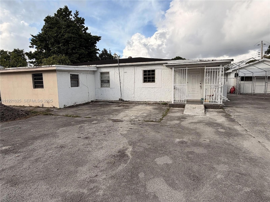 9285 NW 32nd Ct, Miami, FL 33147 - photo 1