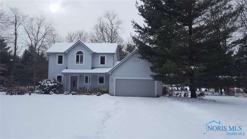 Great curb appeal, nestled in the evergreens, acro