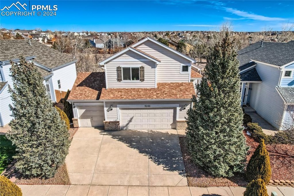 Front of property with 3 car garage