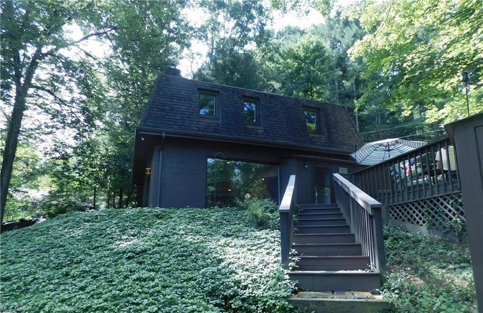 Front view of house featuring a deck