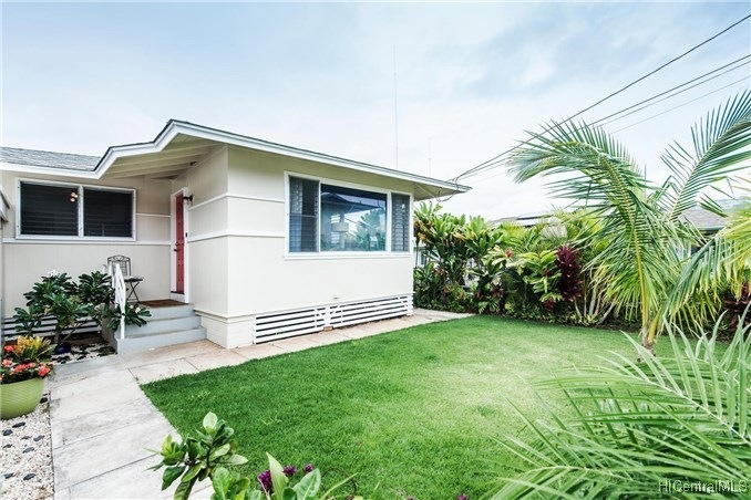 Enter your home through these landscaped fenced ga
