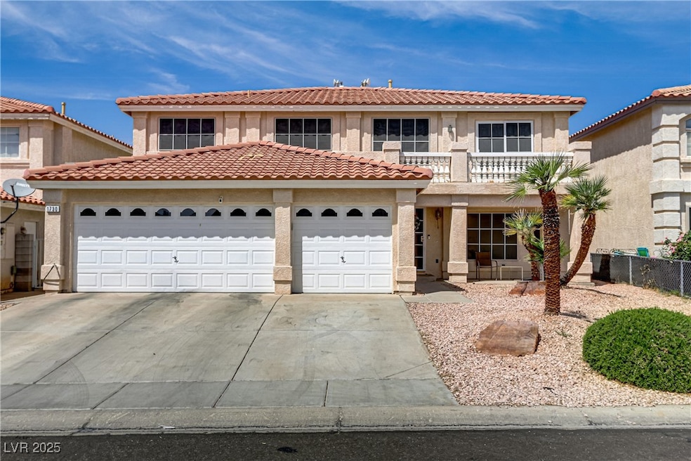 Mediterranean / Spanish-style home with concrete d