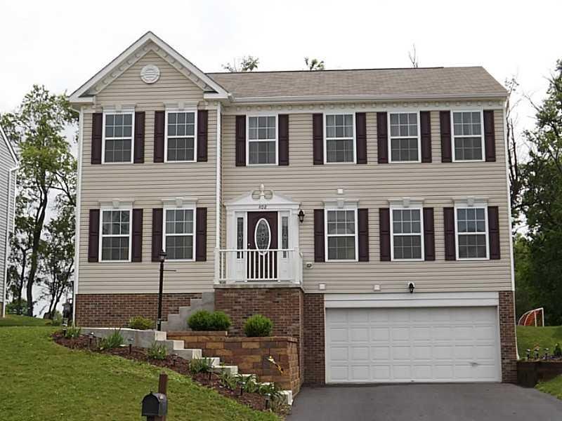 Exterior Front. Level Driveway!