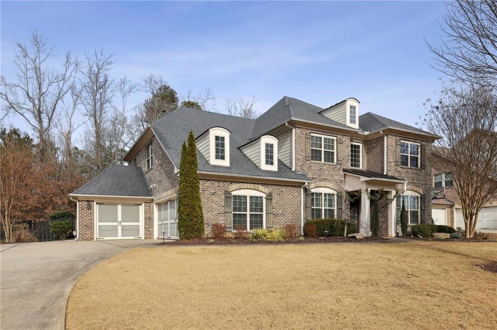 View of front of this four sides brick stunner, fe