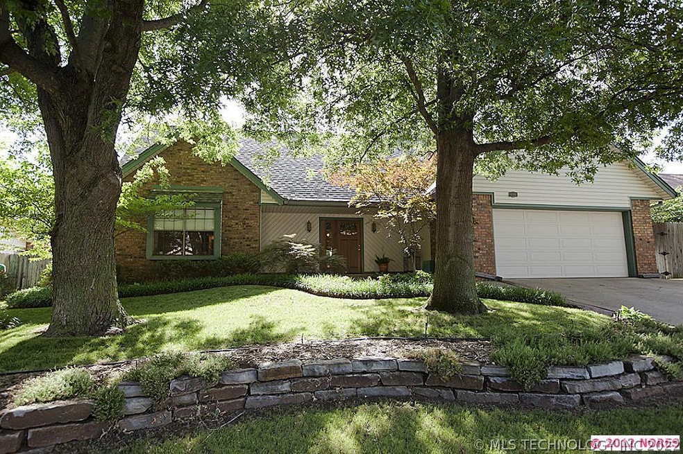 Full brick and vinyl exterior, beautifully landsca