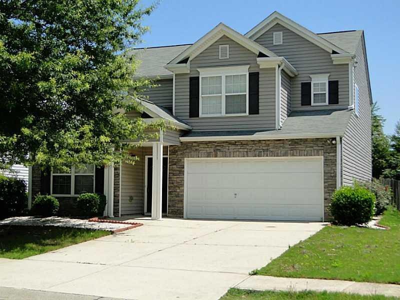 Exterior Front. 4 Bedrooms/2.5 Baths with ALL hard