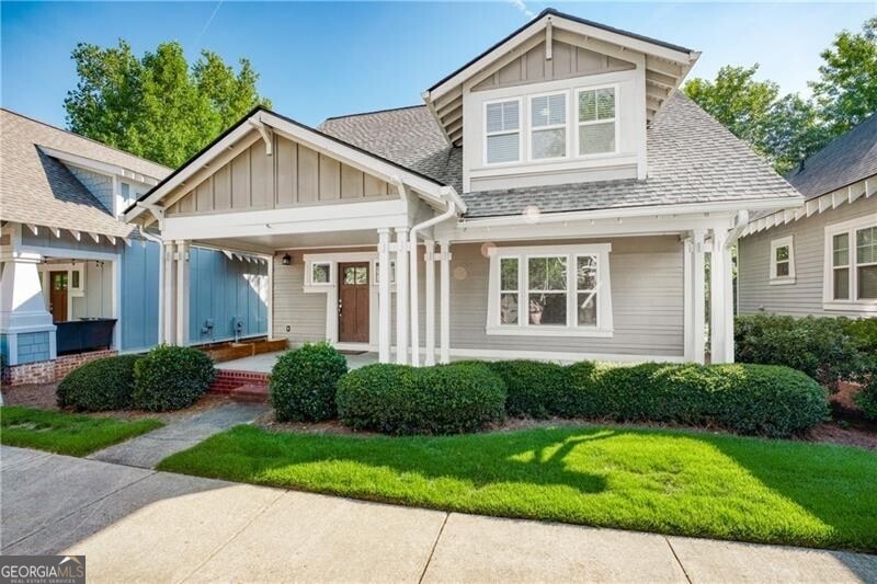 Craftsman inspired home with covered porch and a f