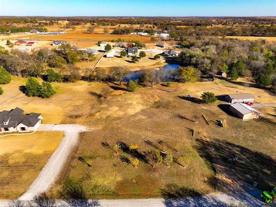 View from 78th St. Can see pond.