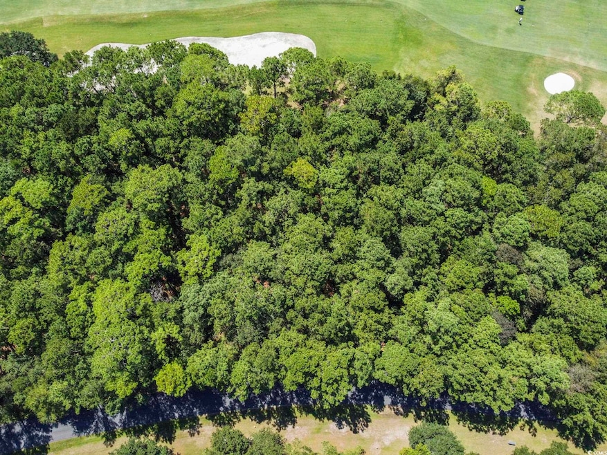 View of property location with a golf club