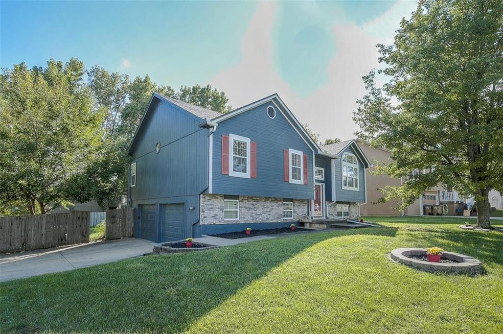 123 E Laredo Trail, Raymore, MO 64083 - photo 1