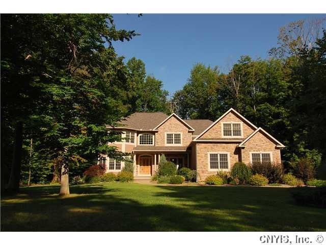 Exterior Front. The professional landscaping and S