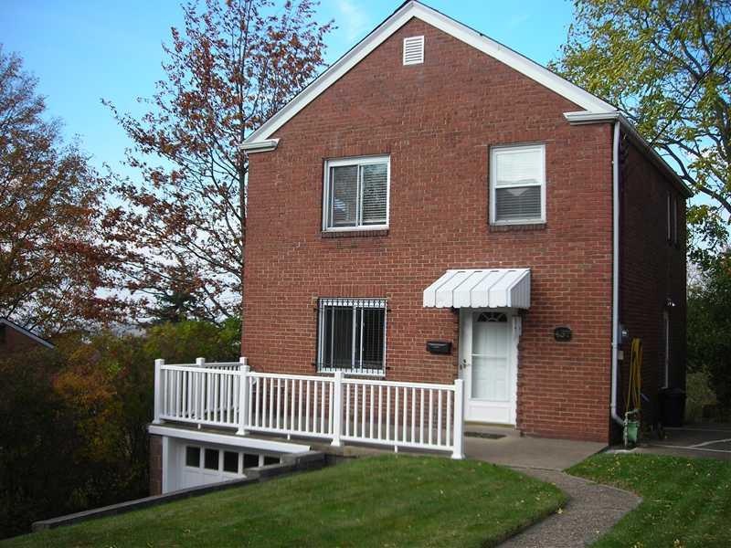 Exterior Front. This all brick home has it all for