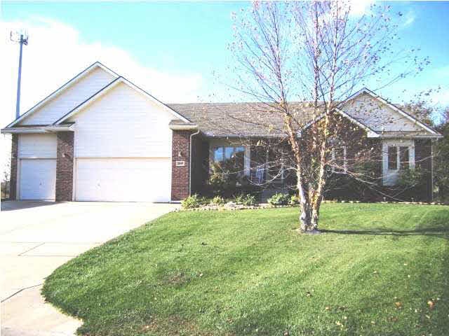 Front of gorgeous home with 3 car garage