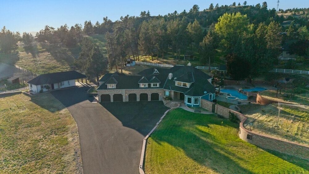 Aerial view of front of home and adu