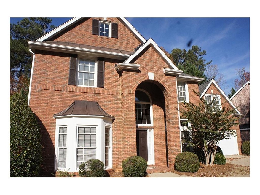 Beautifully maintained brick beauty with curved br