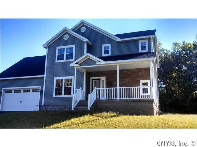 Exterior Front. A home is built with wood and beam