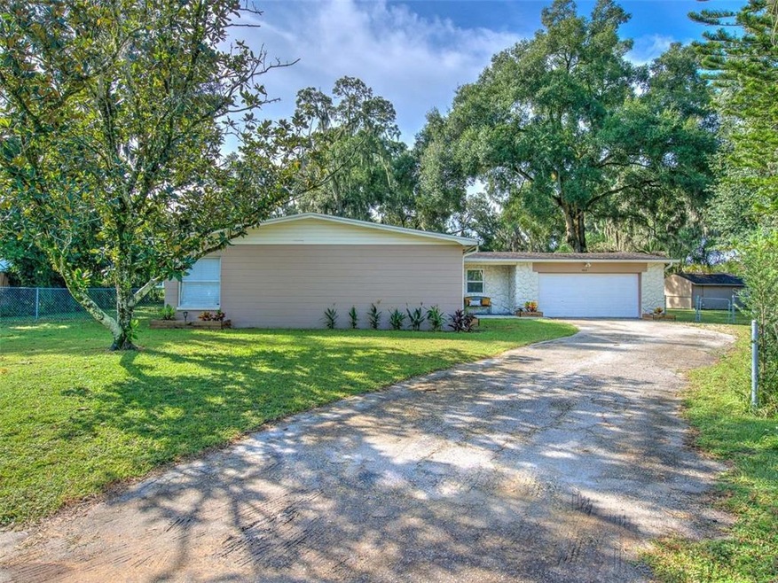Exterior showing large driveway