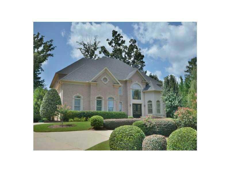 Exterior Front. Circular drive, 3 car garage, CULD