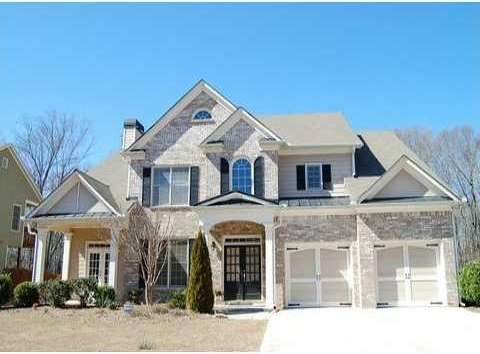 Exterior Front. BRICK WITH FRAME HOUSE FRONT