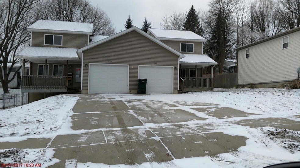 703 W Cavanaugh Rd, Lansing, MI 48910 - photo 1
