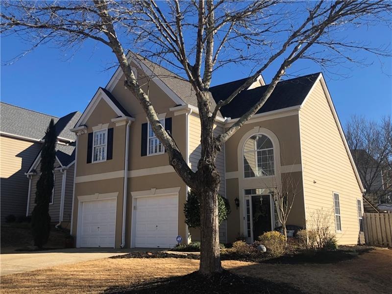 Attractive 2-story Traditional with mature yard an