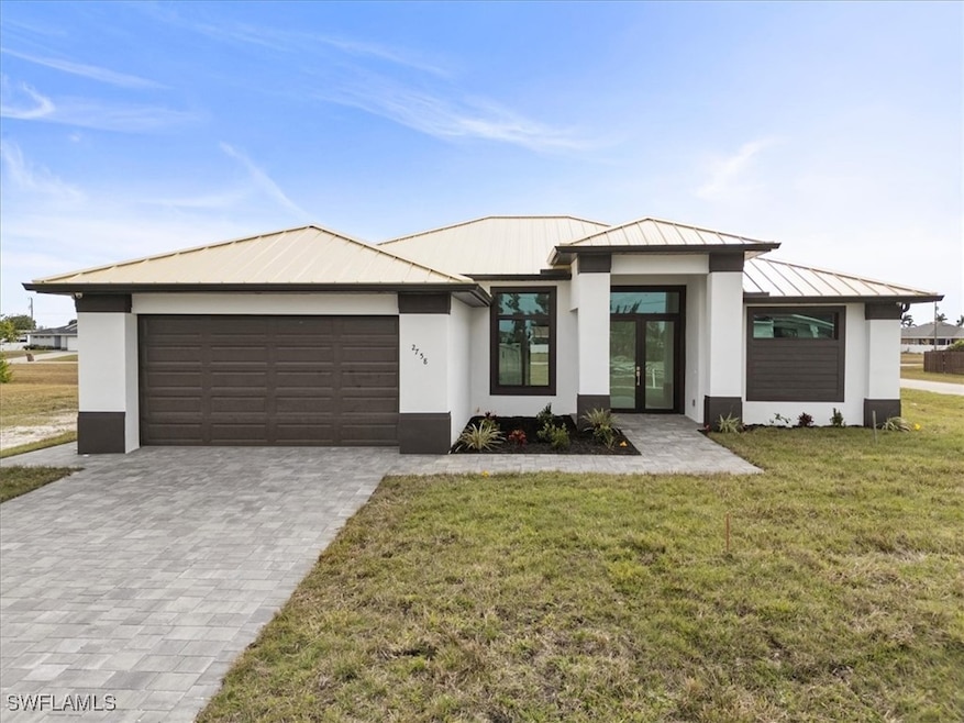 View of front of property featuring a front yard a