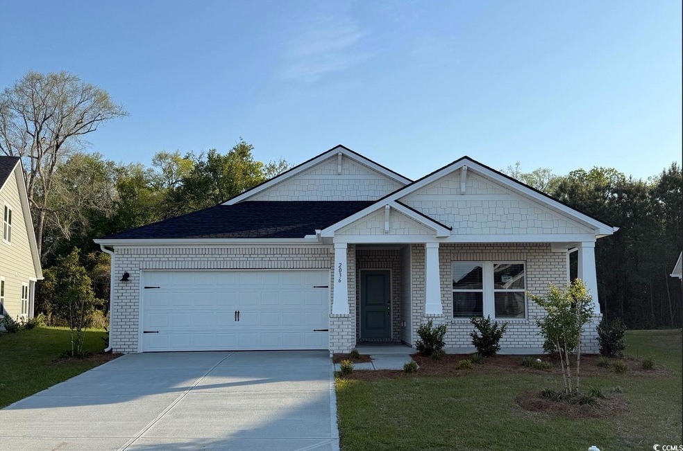 View of front of property with an attached garage,